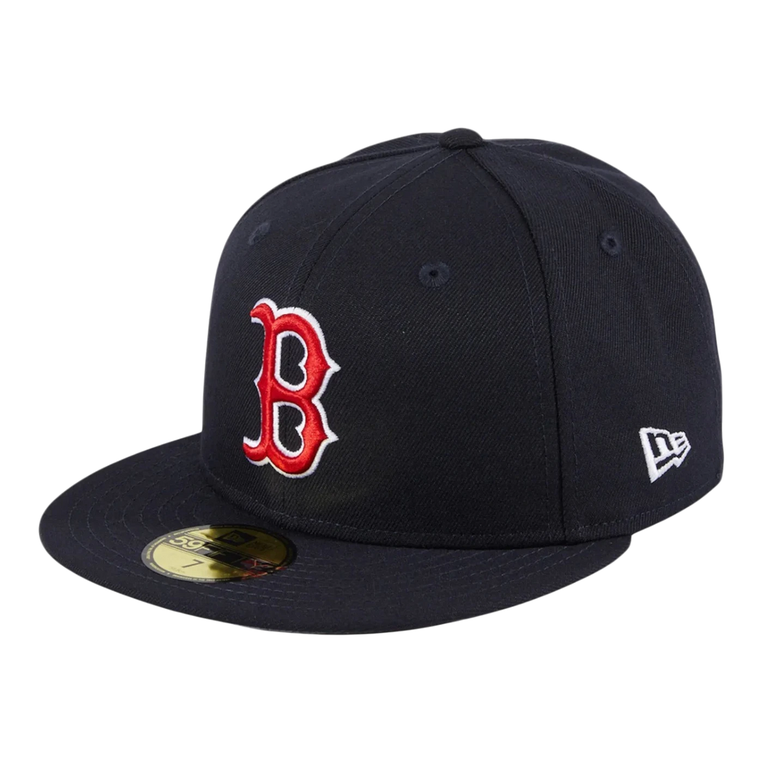 New Era Boston Red Sox fitted baseball cap in navy with red and white embroidered 'B' logo on the front and New Era logo on the side.