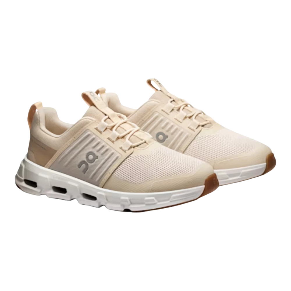 HypeSelection Cloudswift kids sand sneakers with mesh uppers, elastic laces, and white soles.
