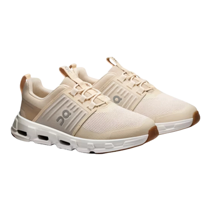 HypeSelection Cloudswift kids sand sneakers with mesh uppers, elastic laces, and white soles.