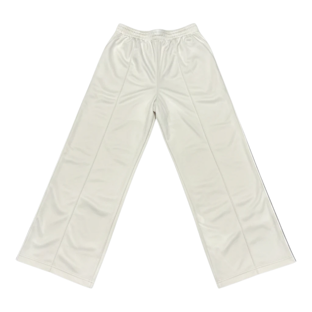 HypeSelection Women's Uniqlo JW Anderson off-white polyester track pants with contrast side piping and adjustable zip hems.