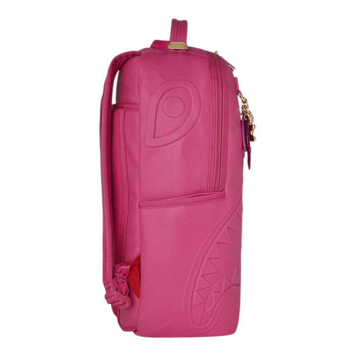 HypeSelection SHARK PINK ATTACK backpack with iconic shark mouth graphic, pink PVC exterior, gold-tone zipper, and embossed eye detail.
