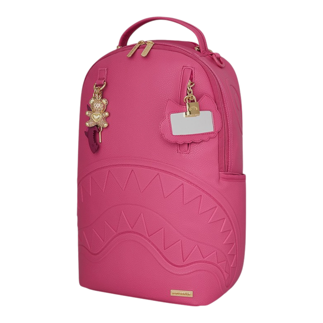 HypeSelection pink faux leather backpack with iconic shark mouth graphic, gold hardware, and teddy bear charm.
