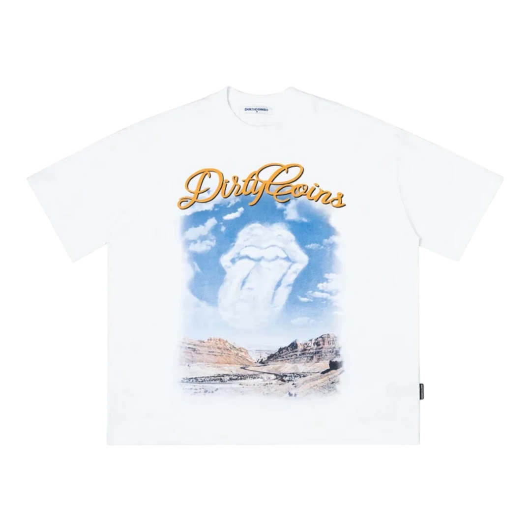 DirtyCoins DCxRS Desert Sky T-Shirt White cotton with graphic print of Rolling Stones tongue logo in clouds over desert landscape.