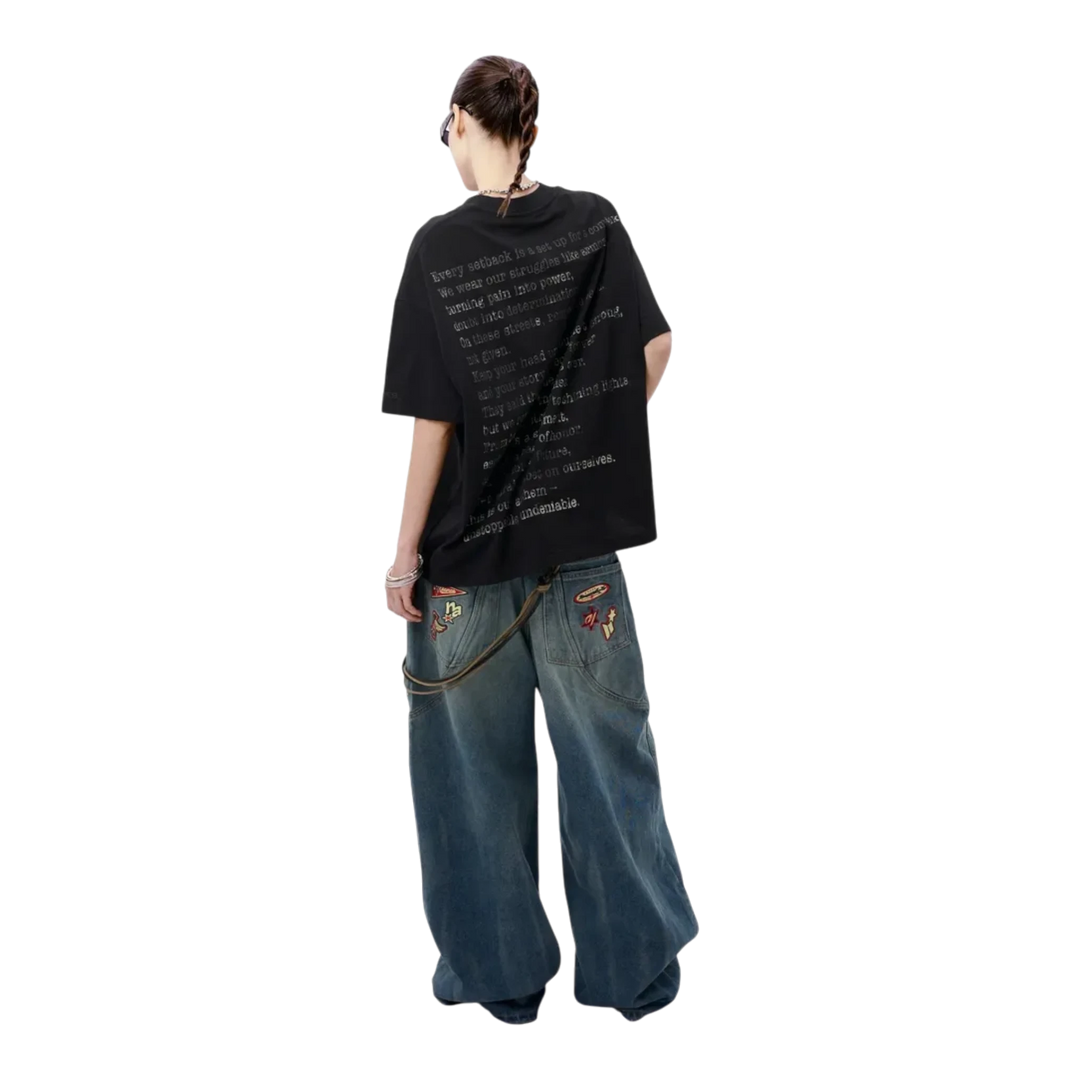HADES black heavyweight cotton oversized tee with graphic text on back. Streetwear fit.