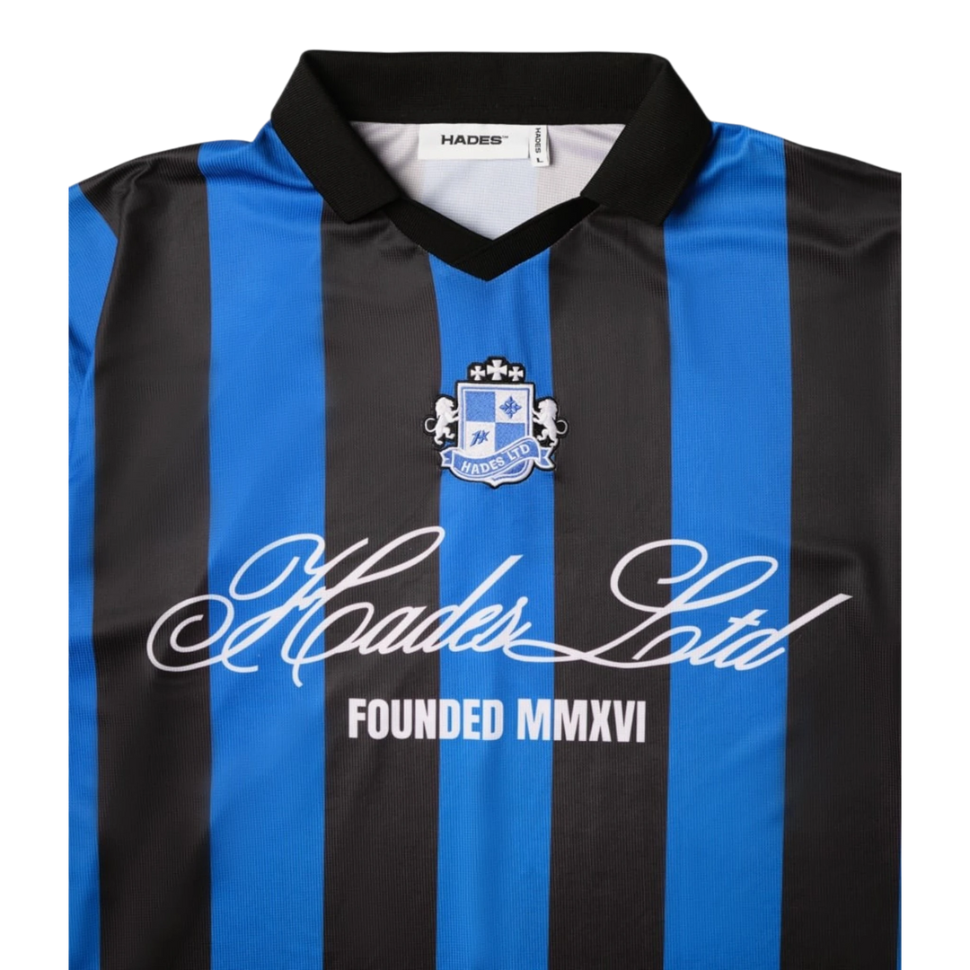 HADES Athlete Ignite Jersey in black and blue vertical stripes, with crest and script logo. Polyester mesh blend.