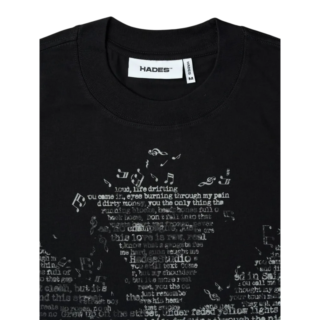 Hades black heavyweight cotton oversized tee with graphic lyrics and musical notes print.