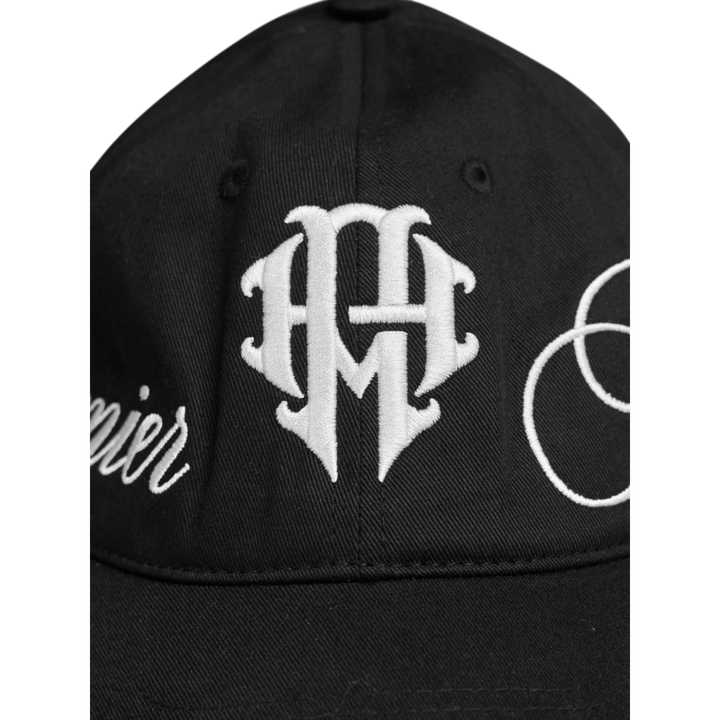HADES Studio black Denim Khaki dad cap with white embroidered crest and side text.