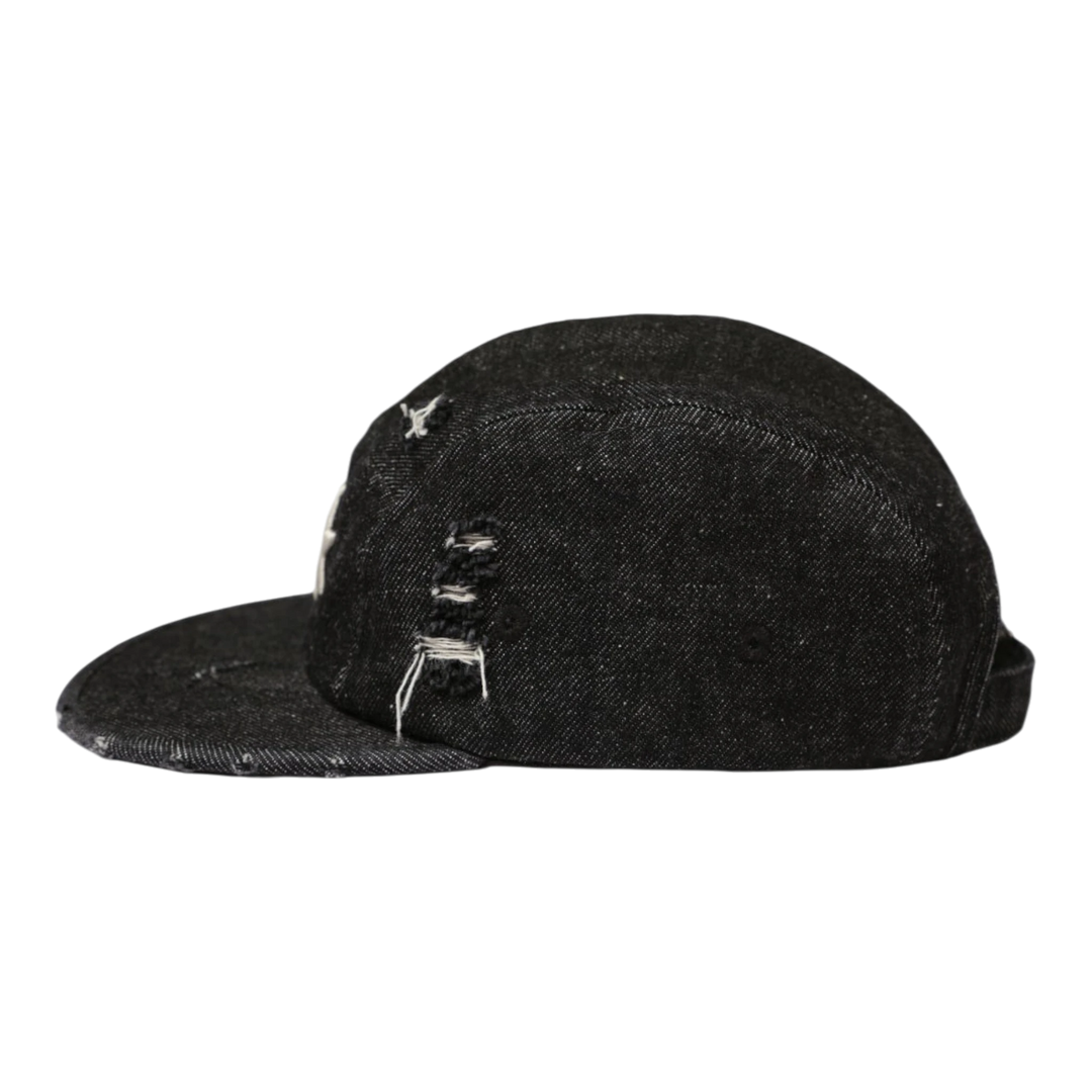 HADES Studio black denim 5-panel camp cap with distressed details and embroidered logo.