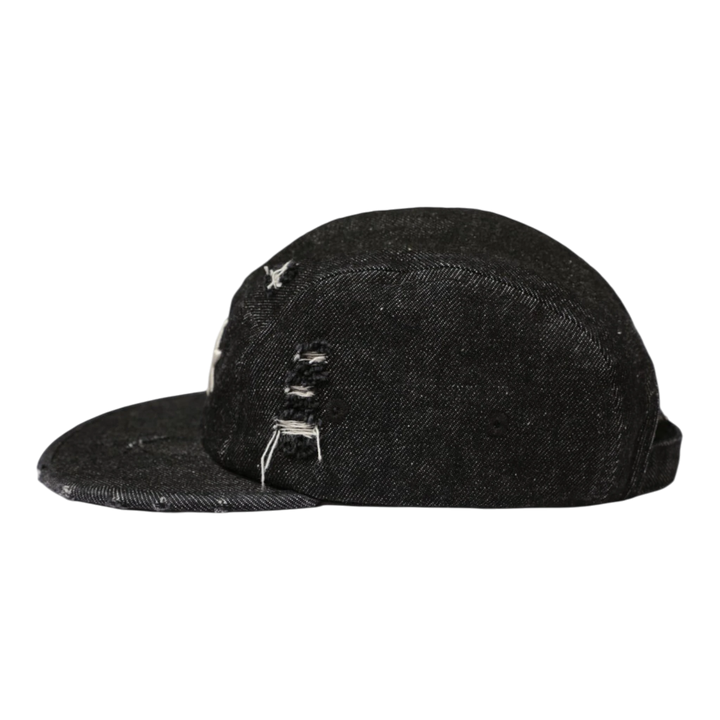 HADES Studio black denim 5-panel camp cap with distressed details and embroidered logo.