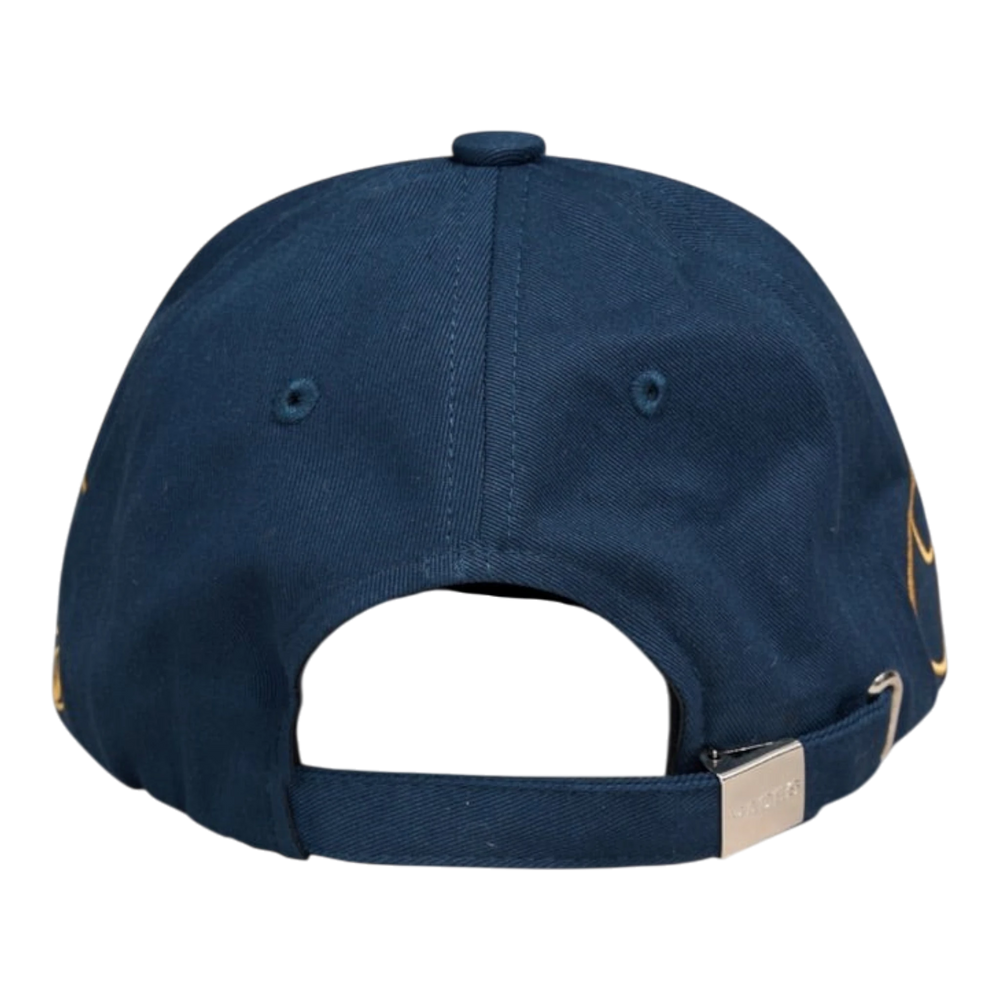 HADES Studio Crest Dad Cap in Blue Navy. Unstructured, low-profile cap with embossed typography and metal buckle adjustment.