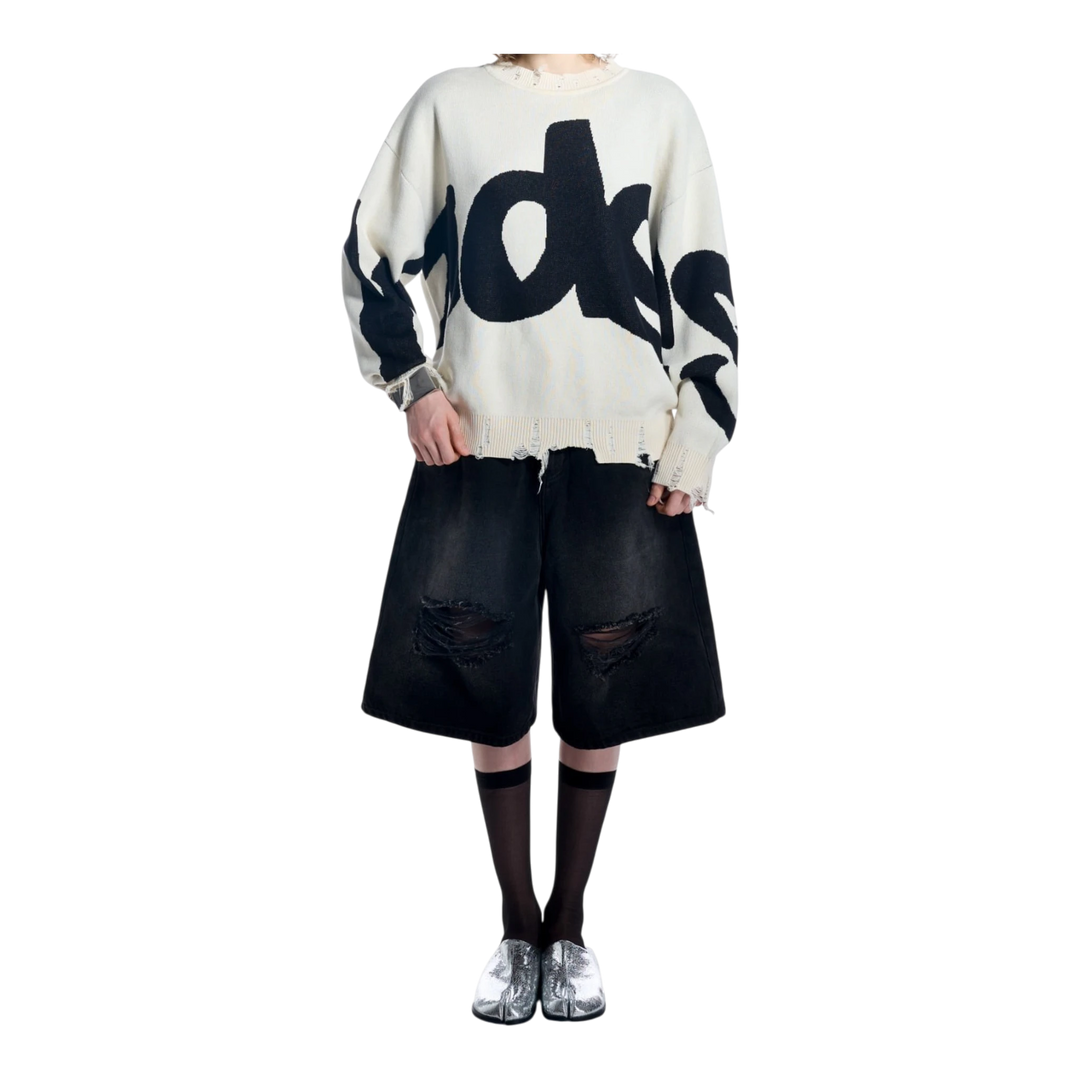 HADES Studio white knit sweater with black woven typography and distressed details. Unisex oversized fit.