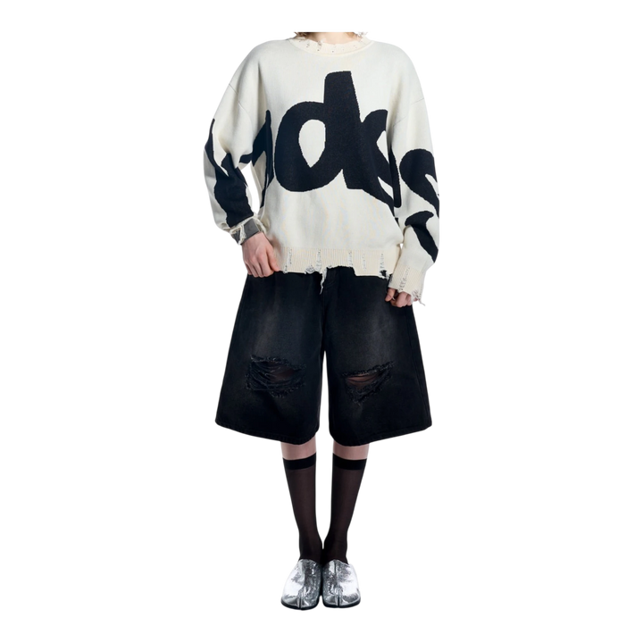 HADES Studio white knit sweater with black woven typography and distressed details. Unisex oversized fit.