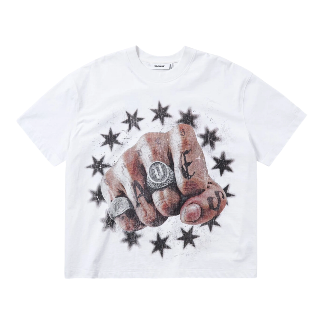 HADES Studio white 100% cotton Valor Grip Tee with a bold fist graphic, tattoo details, rings, and starburst pattern.
