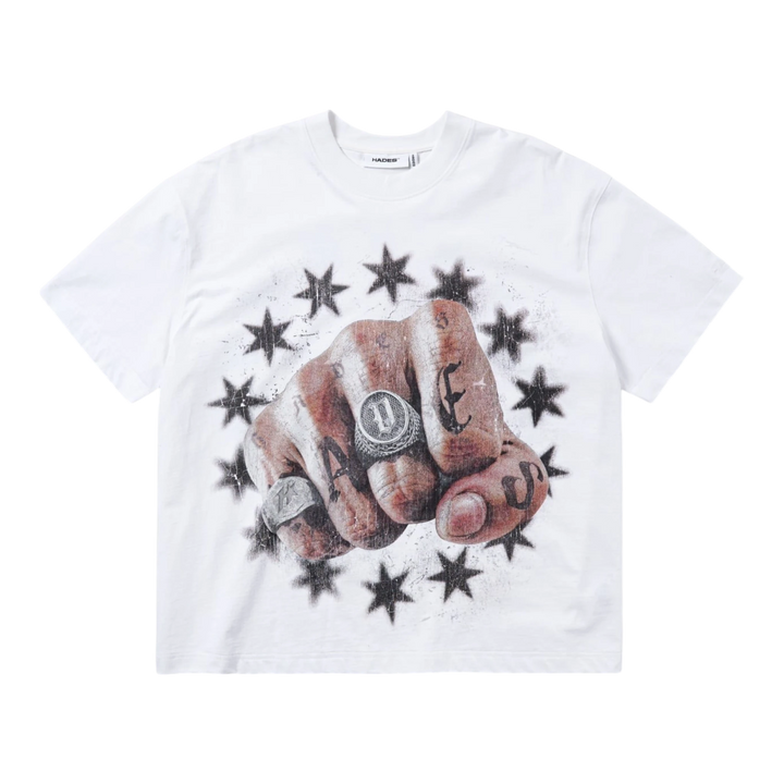 HADES Studio white 100% cotton Valor Grip Tee with a bold fist graphic, tattoo details, rings, and starburst pattern.
