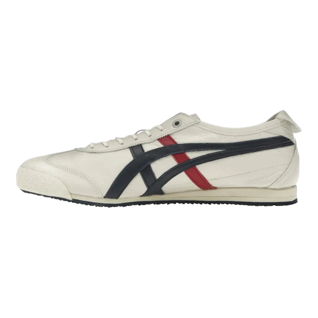 Onitsuka Tiger Mexico 66 SD cream leather sneakers with navy and red Tiger stripes. Low-profile, vintage-inspired design.