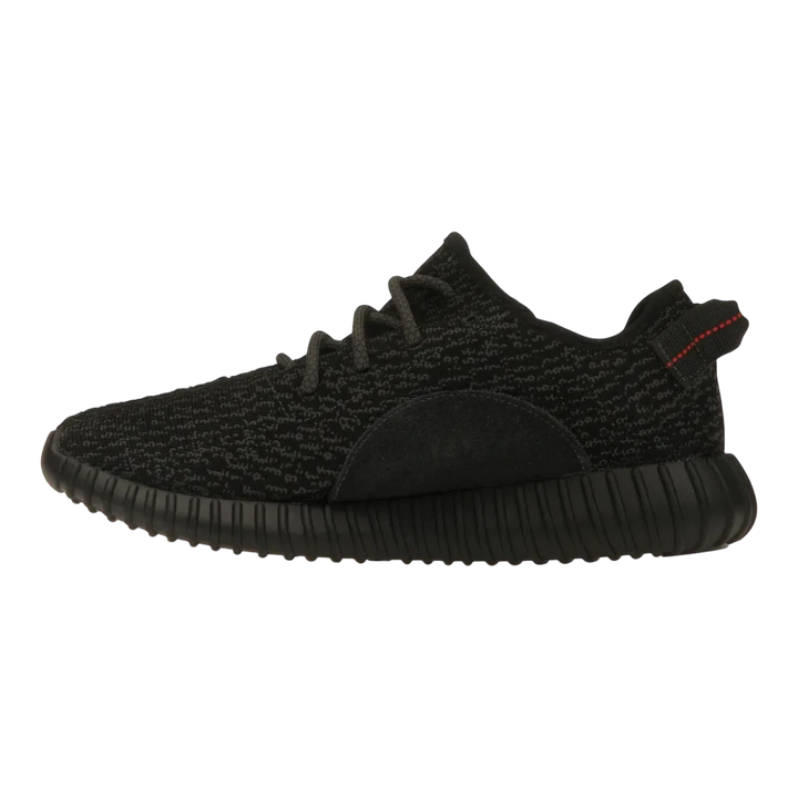 HypeSelection adidas Yeezy Boost 350 Pirate Black 2023 sneaker with black Primeknit upper and red heel tab stitching.