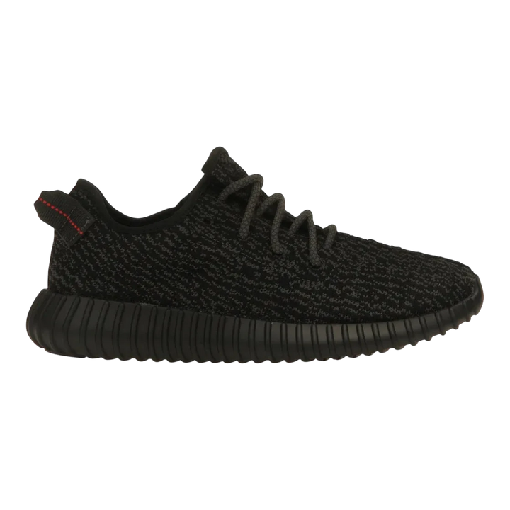 HypeSelection adidas Yeezy Boost 350 Pirate Black 2023 sneaker with black Primeknit upper and red heel tab stitching.