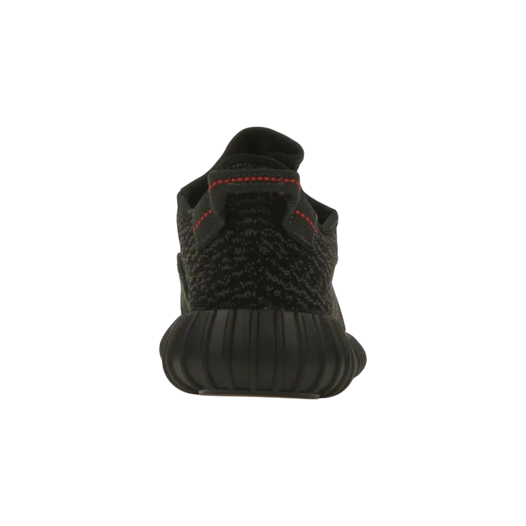 HypeSelection adidas Yeezy Boost 350 Pirate Black 2023 sneaker with black Primeknit upper and red stitching on heel tab.