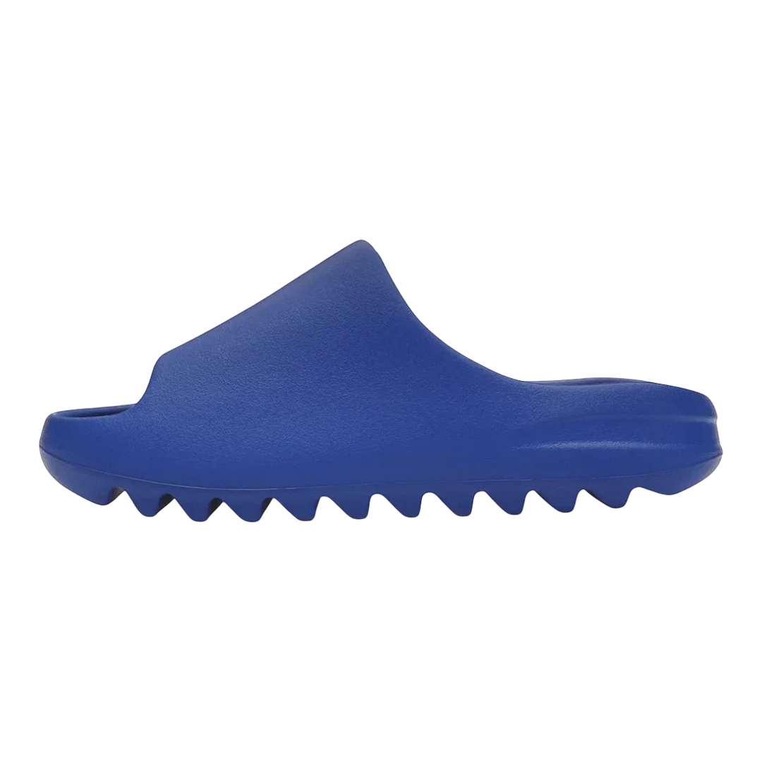 HypeSelection adidas Yeezy Slide Azure blue injected EVA foam slip-on sandal with contoured footbed and serrated outsole.