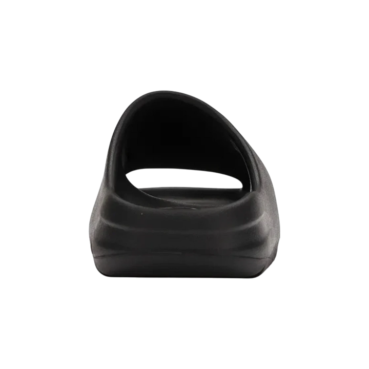 HypeSelection adidas Yeezy Slide Onyx black EVA foam slip-on sandal with contoured footbed and serrated outsole.