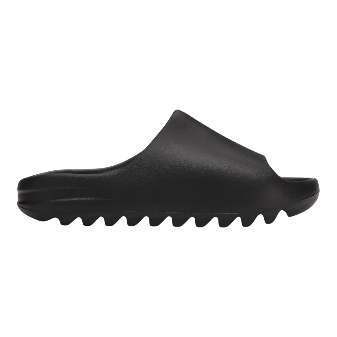 HypeSelection adidas Yeezy Slide Onyx black slip-on slides made from injected EVA foam with contoured footbed.