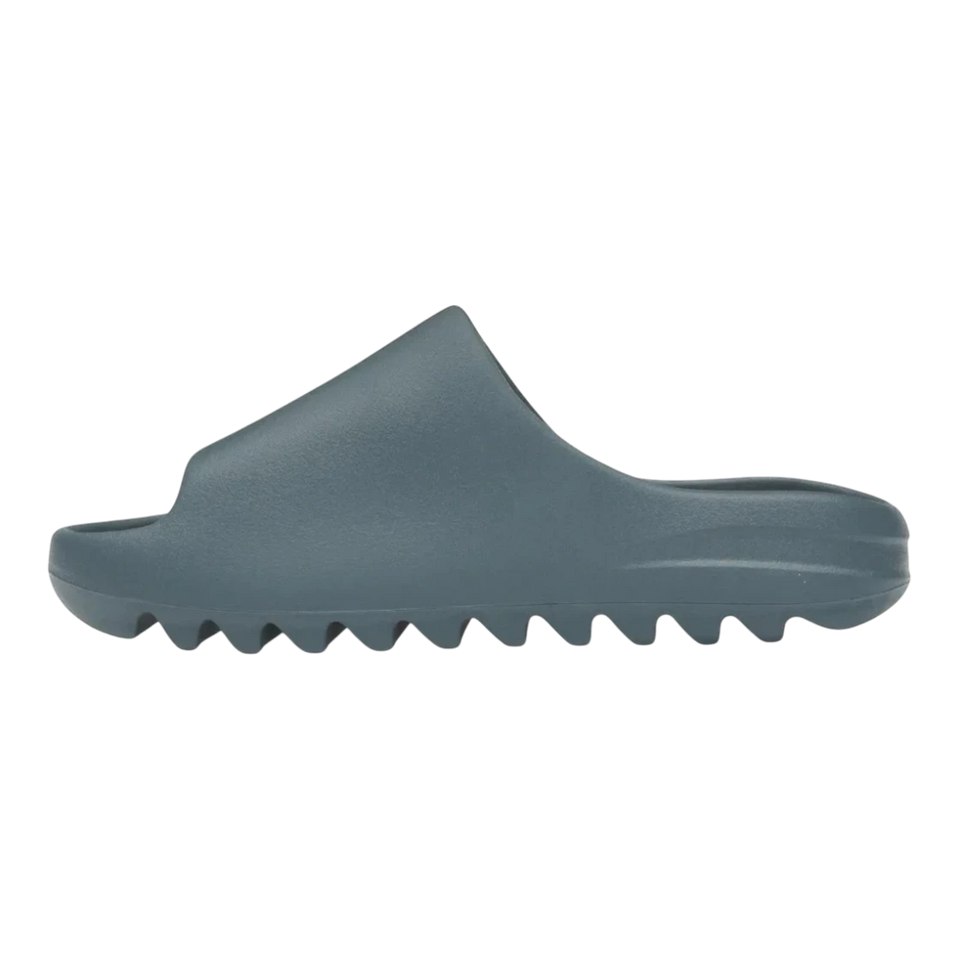 HypeSelection adidas Yeezy Slide in Slate Marine, made of injected EVA foam with a slip-on design and grooved outsole.