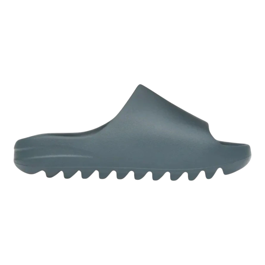 HypeSelection adidas Yeezy Slide in Slate Marine blue-grey, made of injected EVA foam with a slip-on design and grooved outsole.