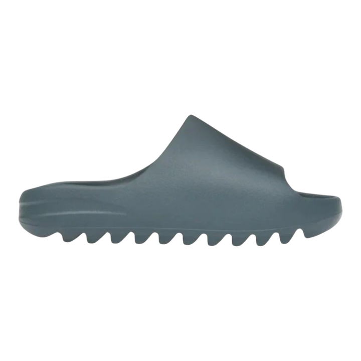 HypeSelection adidas Yeezy Slide in Slate Marine blue-grey, made of injected EVA foam with a slip-on design and grooved outsole.
