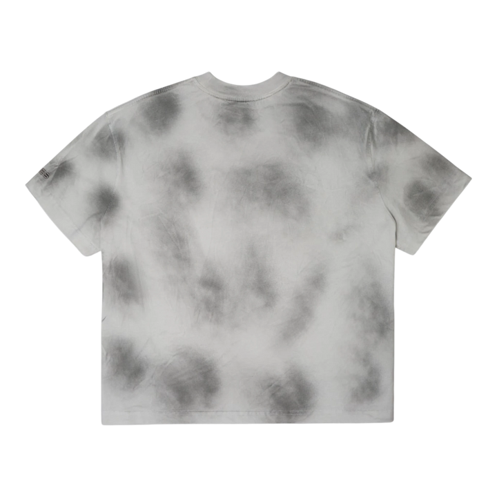 HypeSelection Ash Cloud Tee, a smoke grey tie-dye cotton t-shirt with a unique, hand-processed pattern and a small logo on the sleeve.