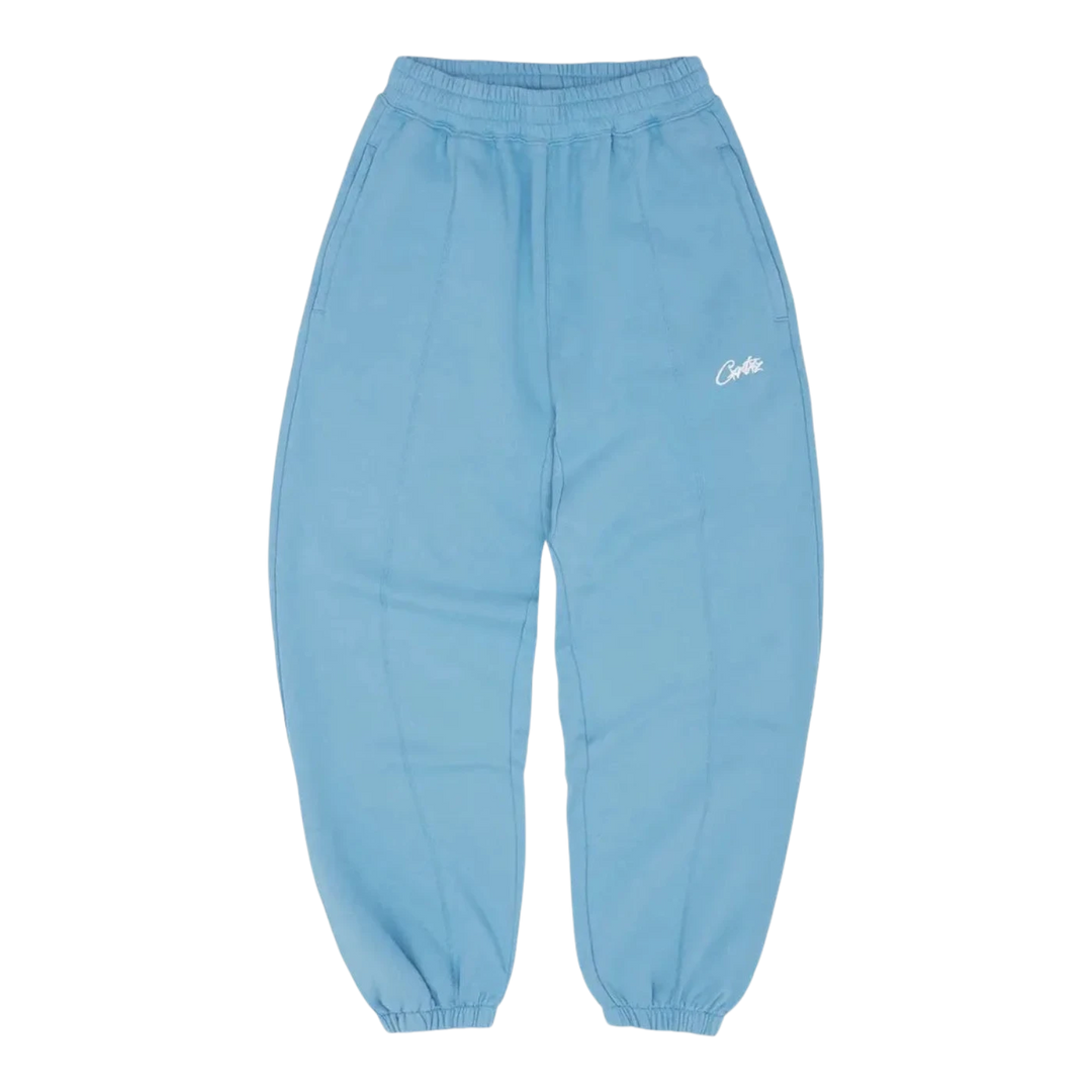 HypeSelection baby blue cotton fleece sweatpants with embroidered logo and zippered pockets. Relaxed baggy fit.