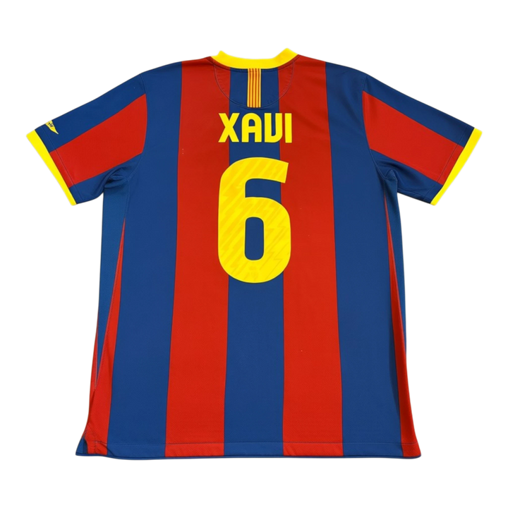 HypeSelection 2010-11 FC Barcelona home football shirt with Xavi 6 on the back, featuring blue and red vertical stripes and yellow trim.