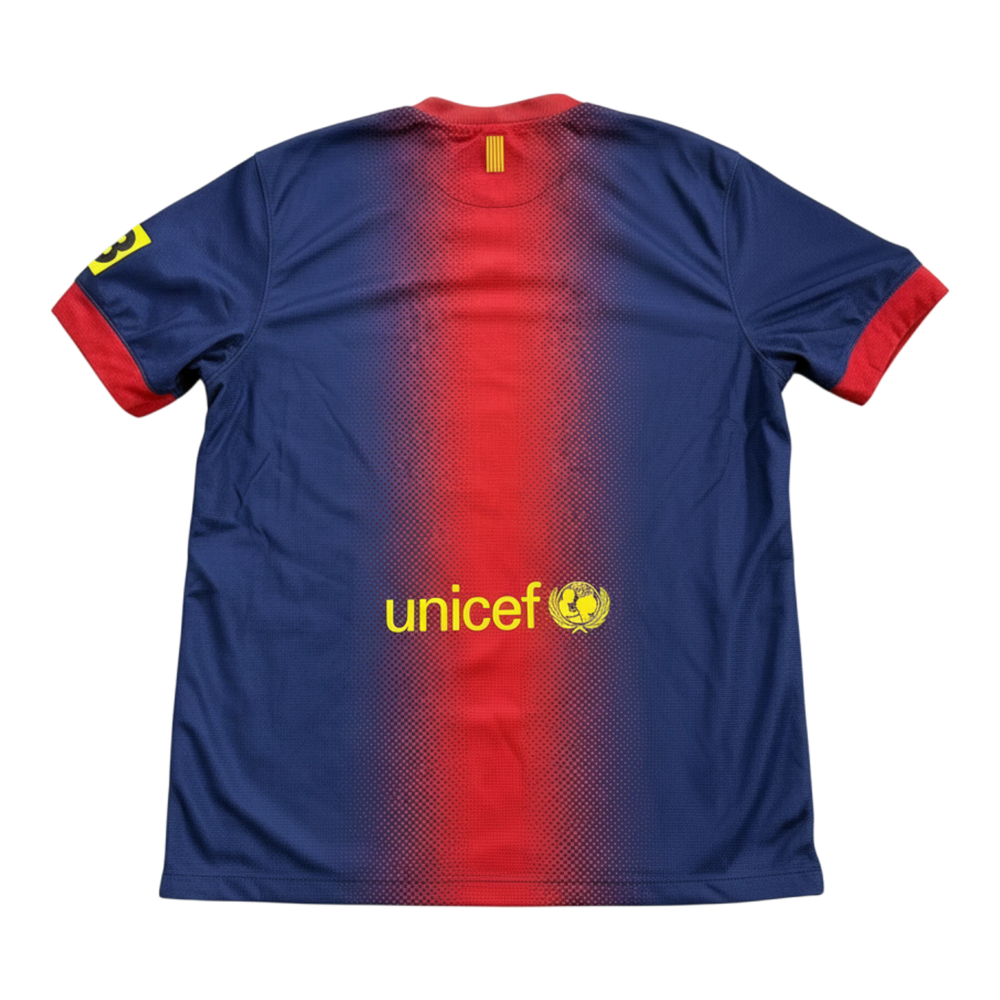 HypeSelection vintage 2012-13 FC Barcelona home shirt with gradient red and blue stripes, UNICEF logo, and yellow number 3 on sleeve.
