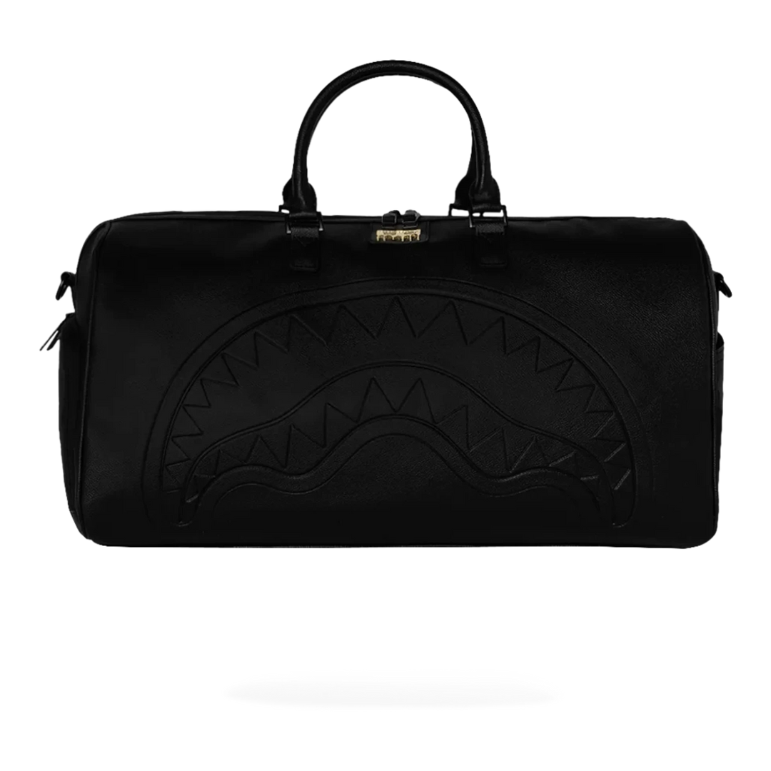 HypeSelection black eco-leather duffle bag with embossed shark mouth design and gold zipper.