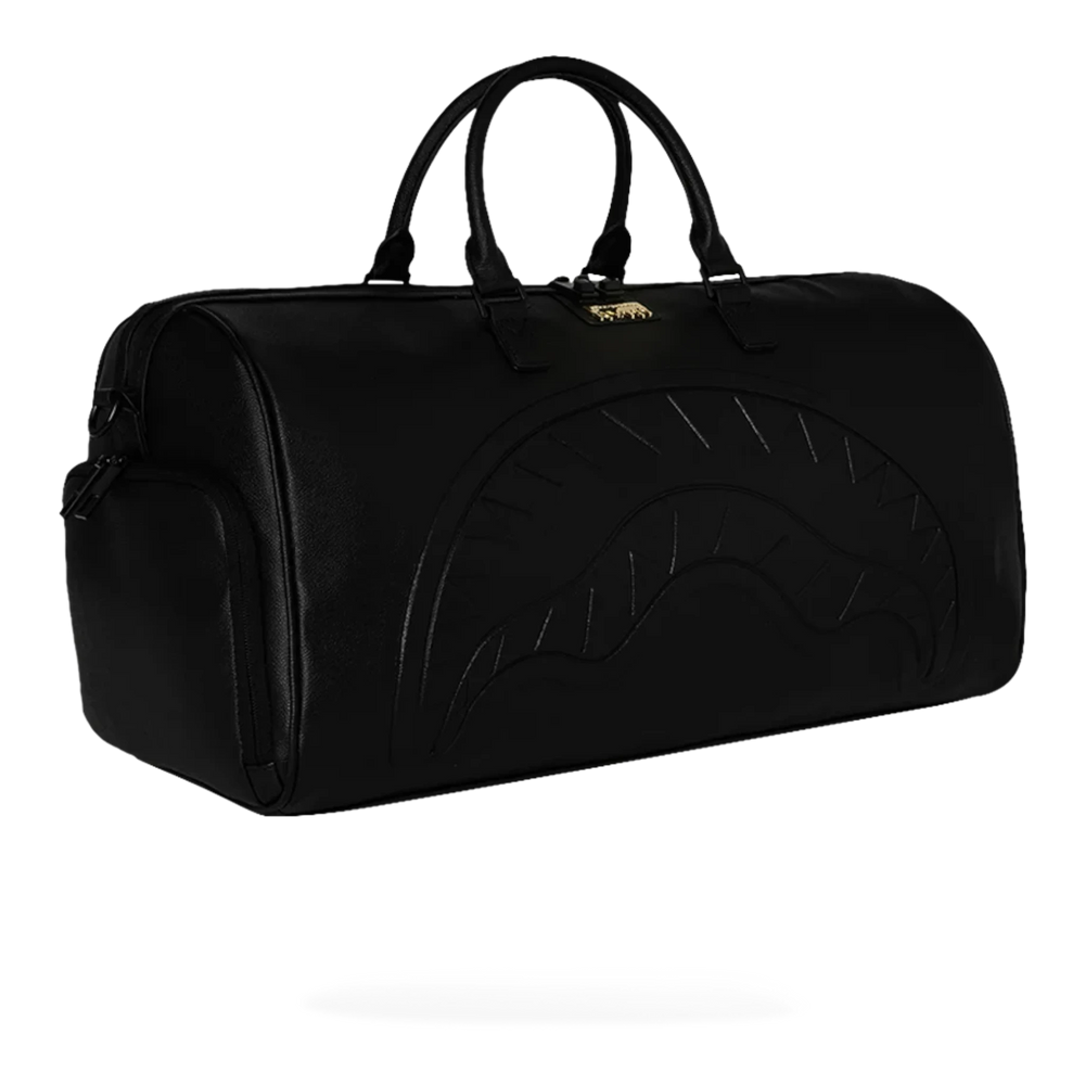 HypeSelection black eco-leather duffle bag with embossed shark mouth design and gold hardware. Features top handles and side pockets.