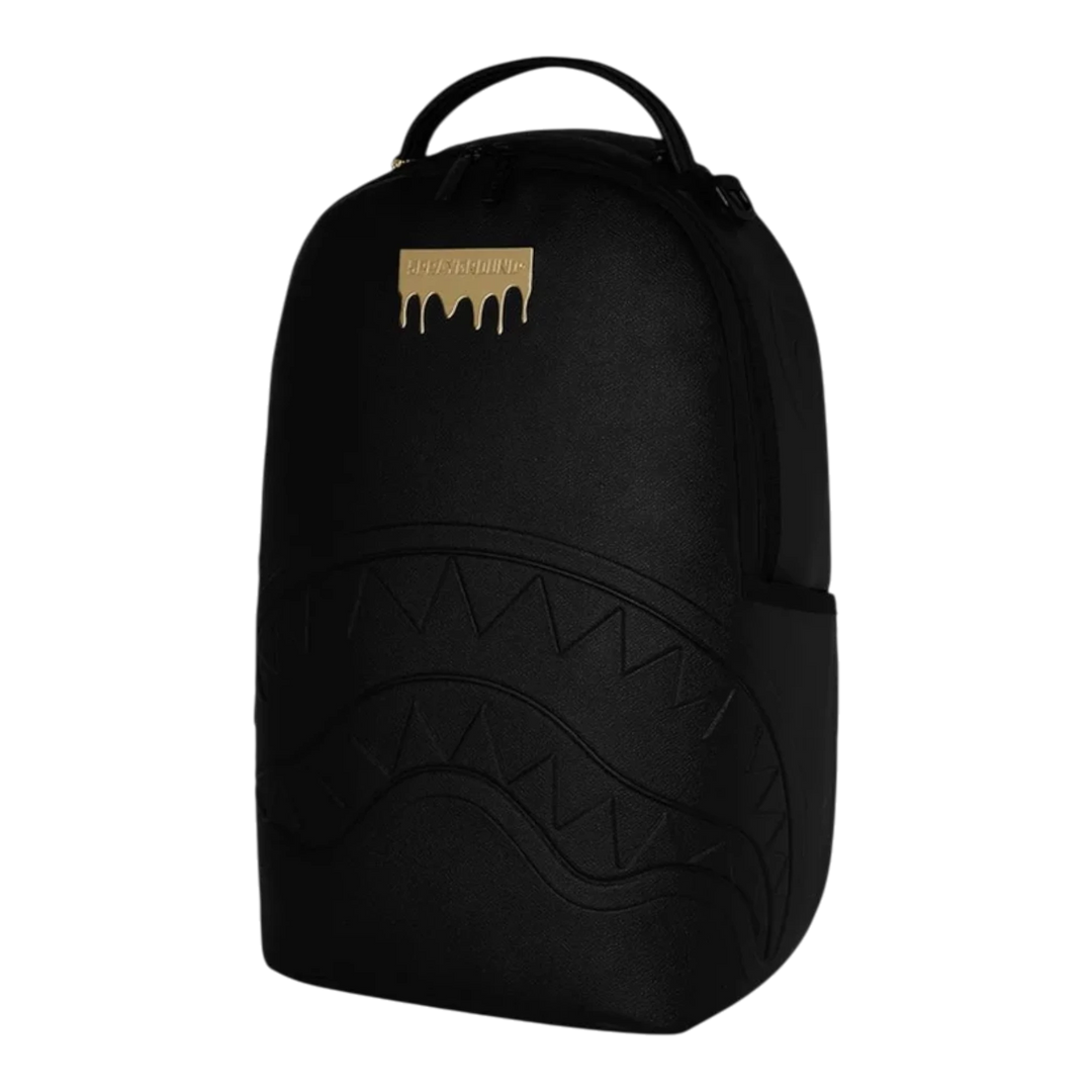 HypeSelection black faux leather backpack with gold dripping logo and shark teeth graphic detail.
