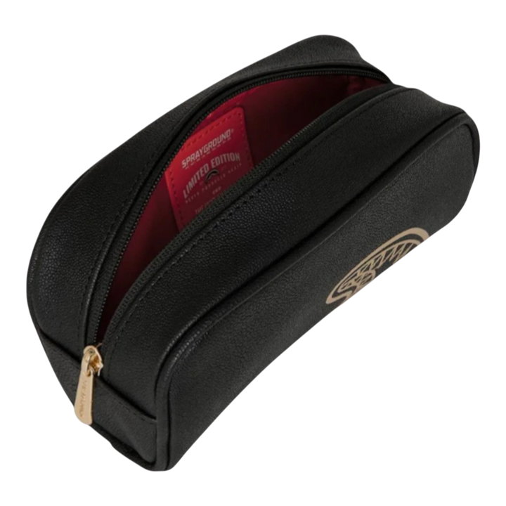 HypeSelection black PVC pouch with gold detailing and red interior, featuring a zip closure and Sprayground logo.