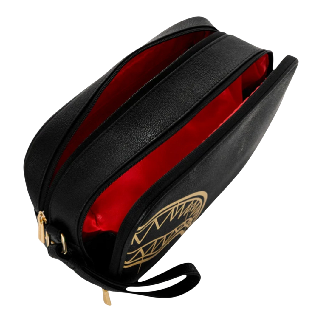 HypeSelection black toiletry bag with gold graphic and red interior. Structured, zippered case for travel or everyday essentials.