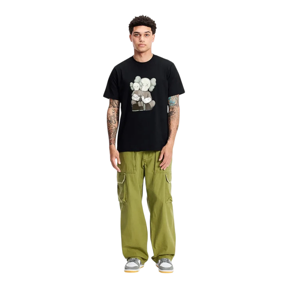 HypeSelection black cotton short sleeve t-shirt with KAWS graphic print on chest, crew neck.
