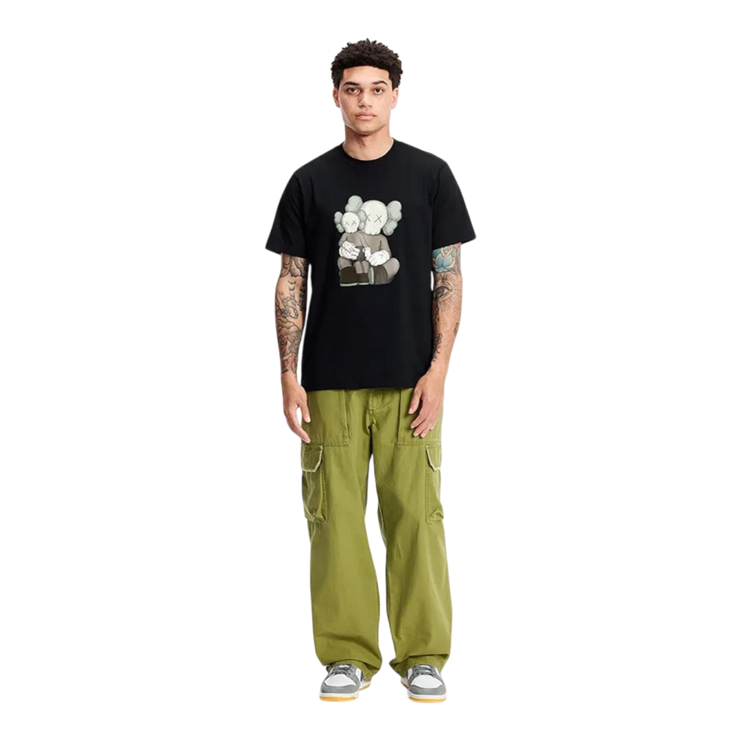 HypeSelection black cotton short sleeve t-shirt with KAWS graphic print on chest, crew neck.