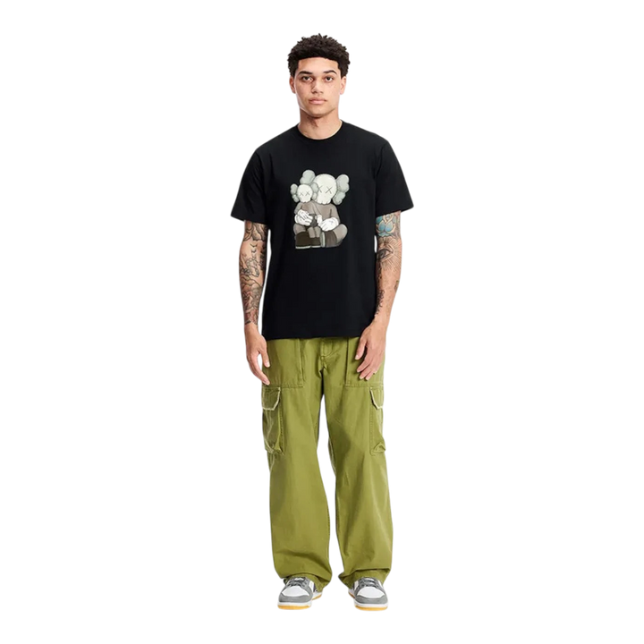 HypeSelection black cotton short sleeve t-shirt with KAWS graphic print on chest, crew neck.