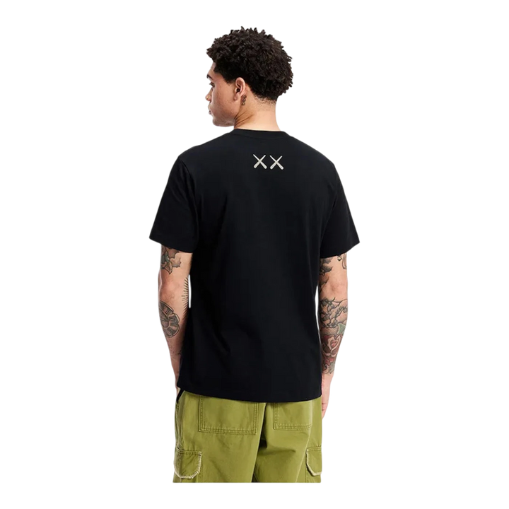 HypeSelection black cotton KAWS x Uniqlo UT short sleeve t-shirt with XX graphic on back.