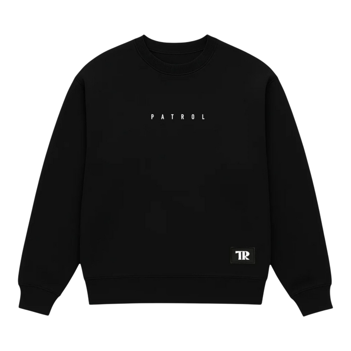 HypeSelection black cotton fleece sweatshirt with "PATROL OG" text and TR logo patch. Oversized fit.