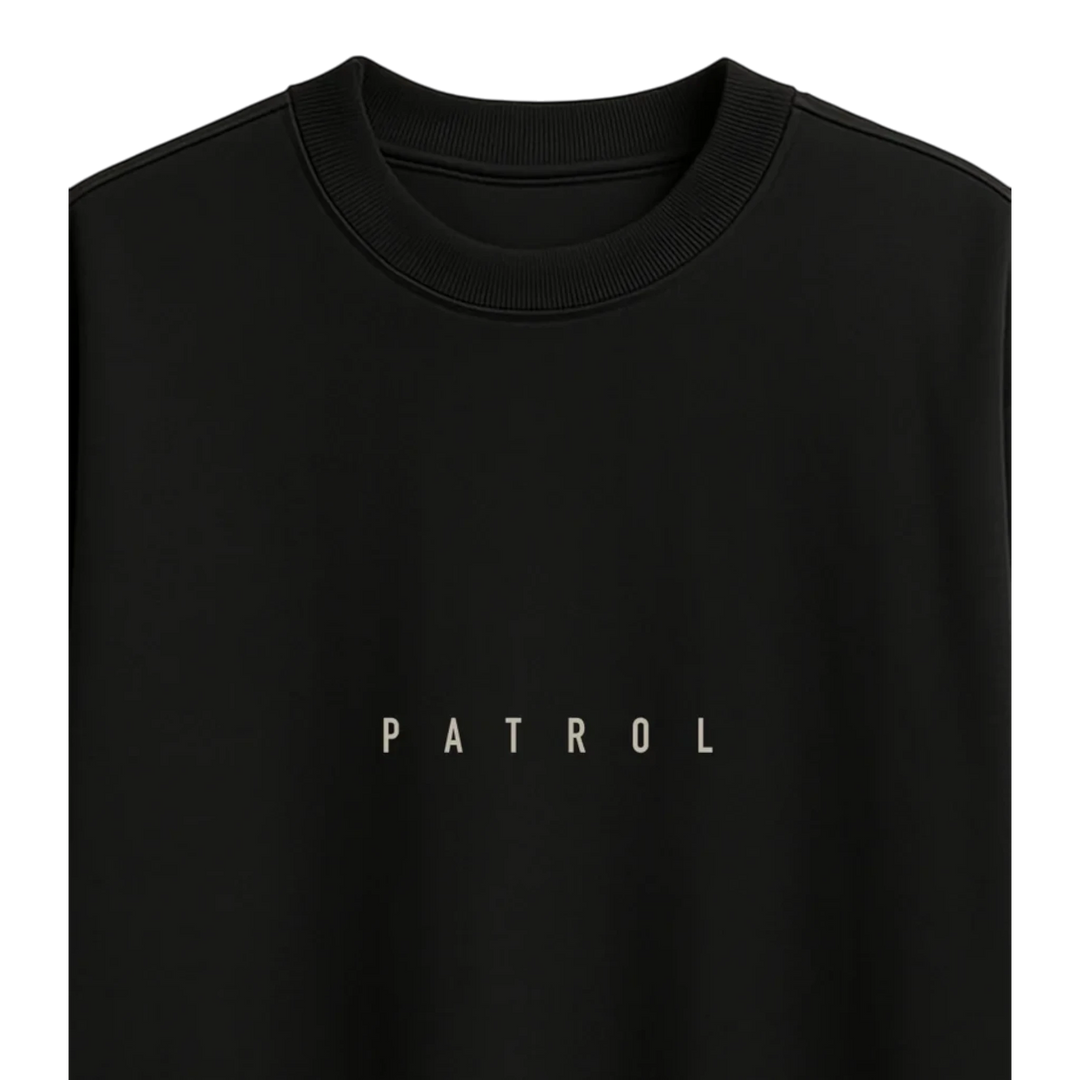 HypeSelection black crewneck sweatshirt featuring the word PATROL printed in a minimalist white font on the chest.