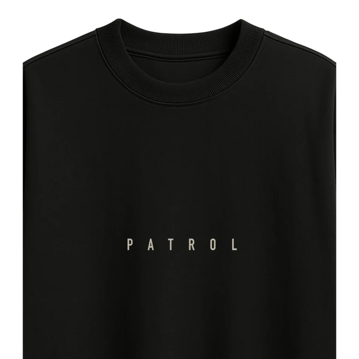 HypeSelection black crewneck sweatshirt featuring the word PATROL printed in a minimalist white font on the chest.