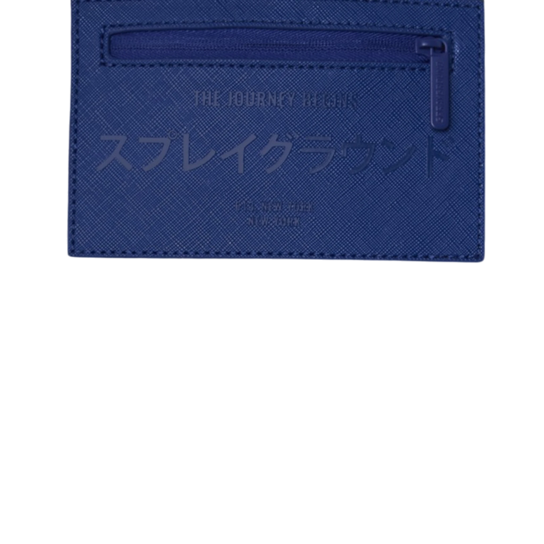 HypeSelection blue faux leather Sprayground BENCH CLEARING backpack with embossed Japanese text and zipper detail.