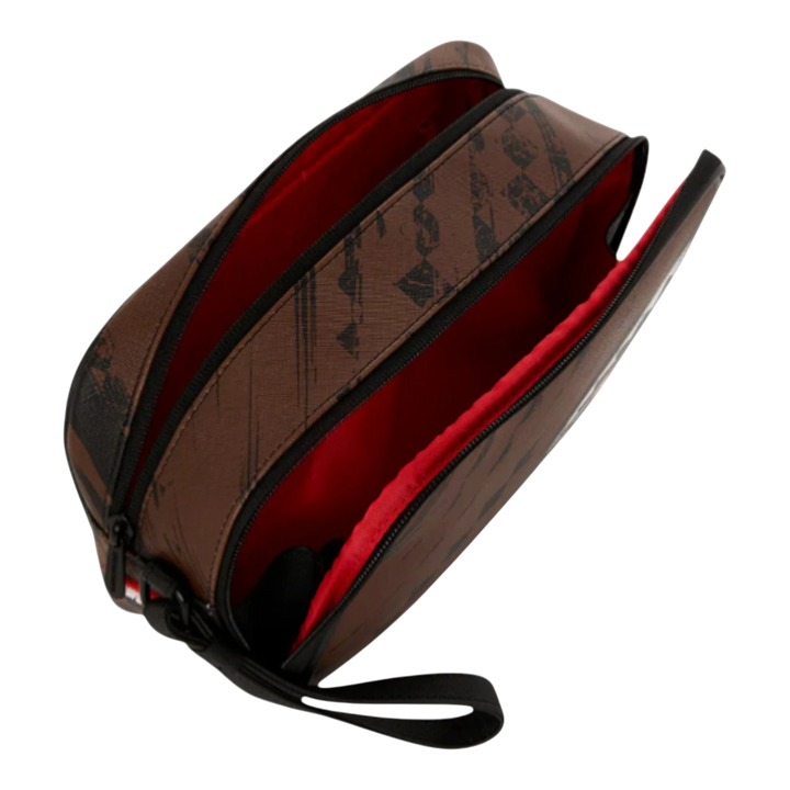 HypeSelection brown PVC toiletry bag with smeared grunge graphic design and red interior. Dual zip compartments and side handle.