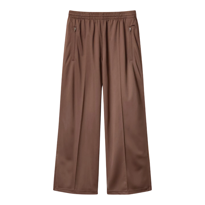 HypeSelection brown polyester track pants with relaxed fit, elastic waistband, zip pockets, and zip-adjustable hems.