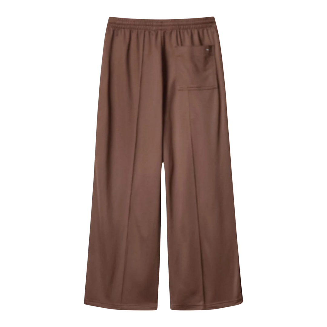 HypeSelection brown polyester track pants with a relaxed, straight-leg fit, elastic waistband, and JW Anderson logo detail.