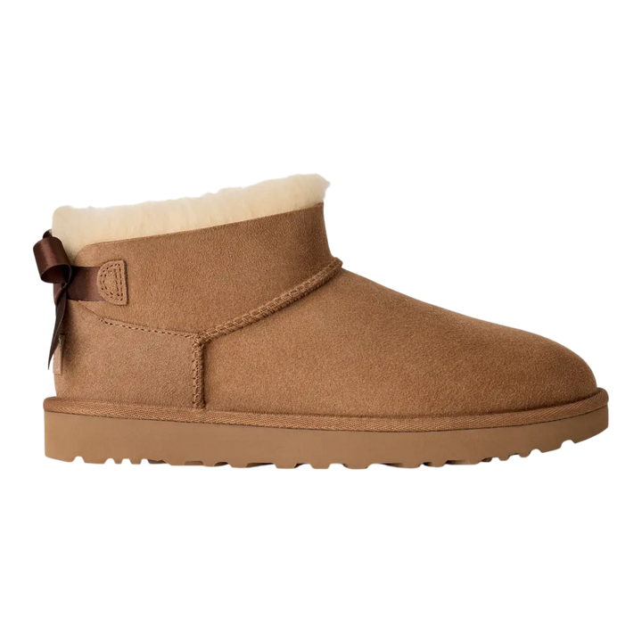 HypeSelection UGG Ultra Mini Bailey Bow boot in chestnut suede with a side satin bow and plush wool lining