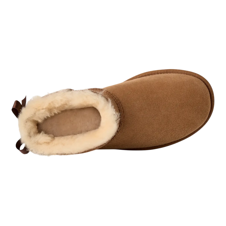 HypeSelection UGG Ultra Mini Bailey Bow boot in chestnut suede with plush wool lining and back satin bow detail